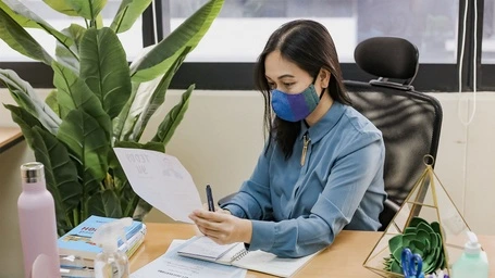 Employee working safely at a desk